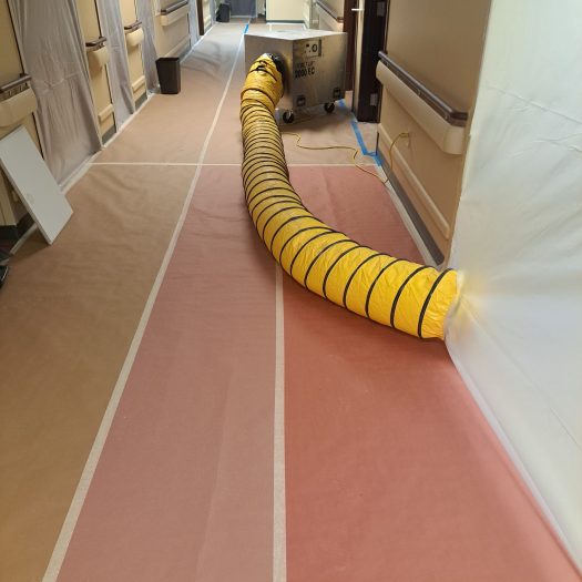 C2G Environmental air scrubber during an abatement project