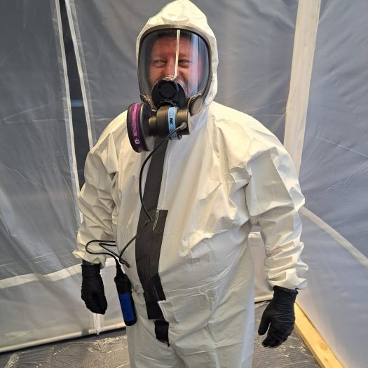 C2G Environmental technician in full PPE