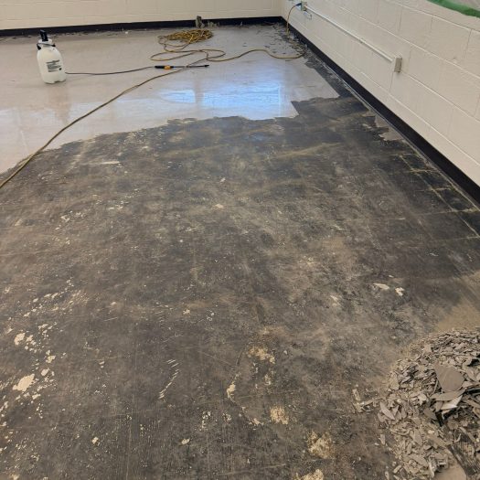 C2G Environmental during an asbestos tile abatement project